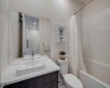 Upper level full bathroom.