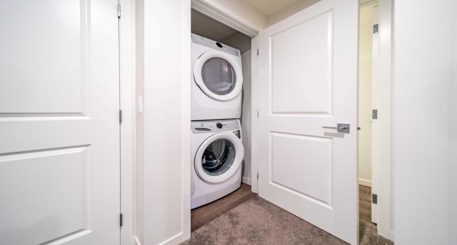 Stacked washer/dryer in basement