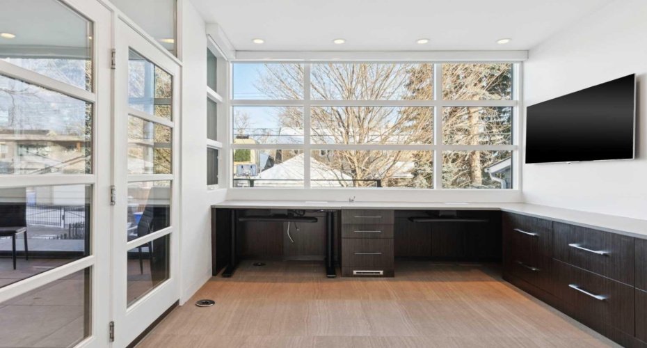 DOUBLE OFFICE WITH ADJUSTIBLE-HEIGHT DESKS, LOCKING FILE DRAWERS AND ADDITIONAL STORAGE FOR PRINTERS ETC