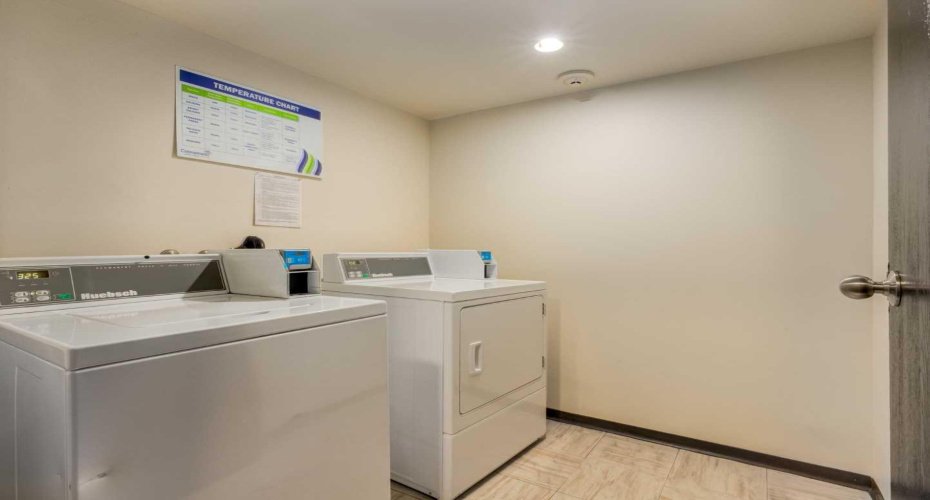 Laundry steps away from unit