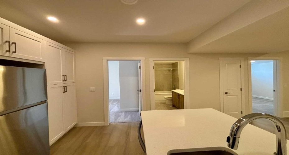 Photos are of property address Versant Rise SW, same Montay II floor plan as 695 Buffaloberry Manor. Photos are representative for layout only, colours and finishes may vary.