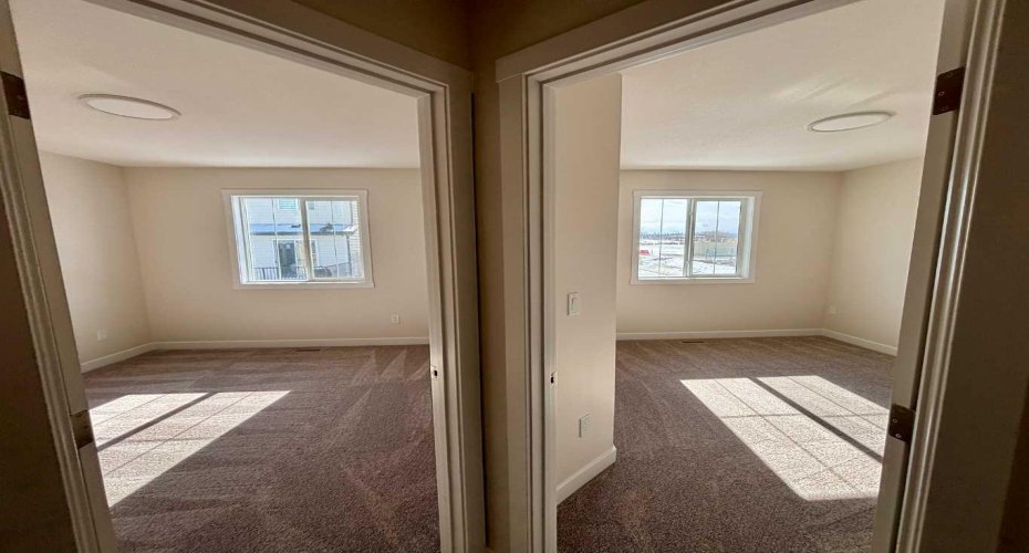 Photos are of property address Versant Rise SW, same Montay II floor plan as 695 Buffaloberry Manor. Photos are representative for layout only, colours and finishes may vary.