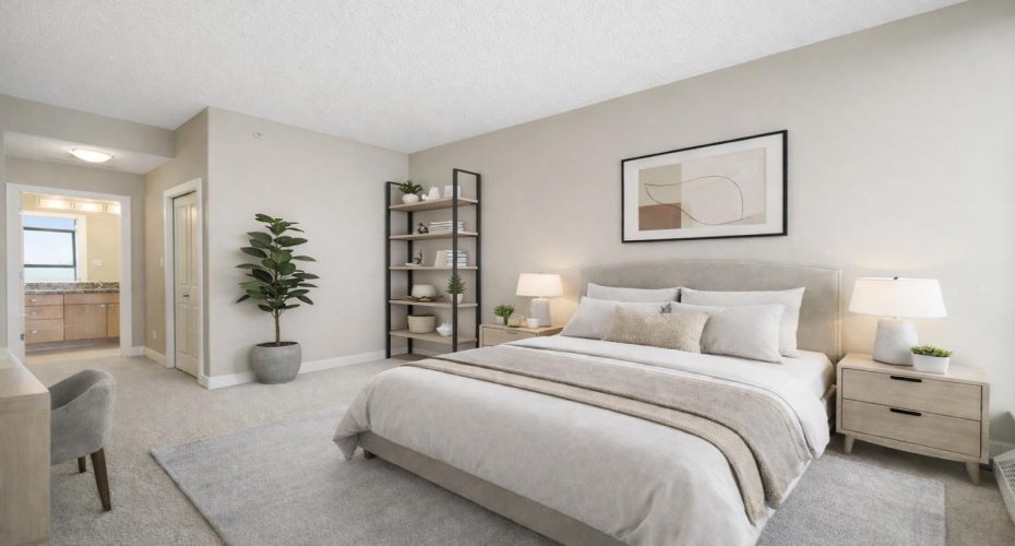 Primary bedroom is generously sized and includes a massive walk-in closet and a private 4-piece ensuite bathroom