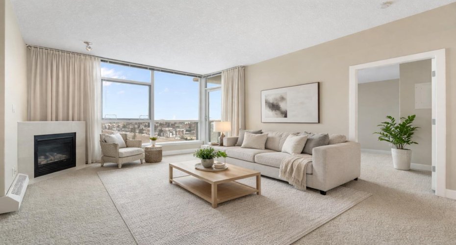 The open-concept living area is anchored by a cozy gas fireplace