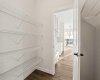 Walkthrough pantry off of the mudroom.