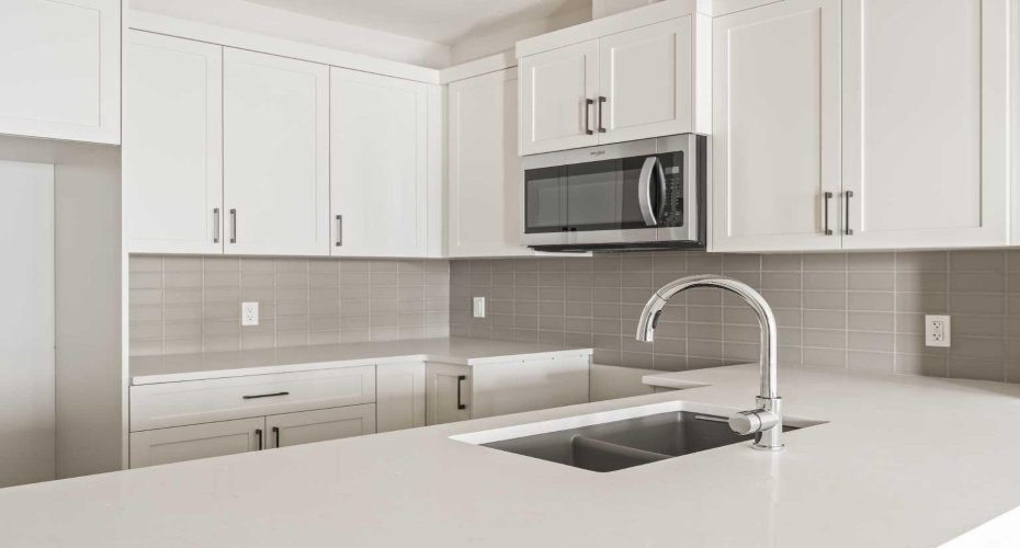 Lower level kitchen for suite in walkout basement.