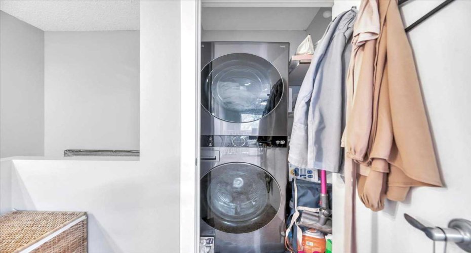 Laundry space with high end washer/dryer unit.