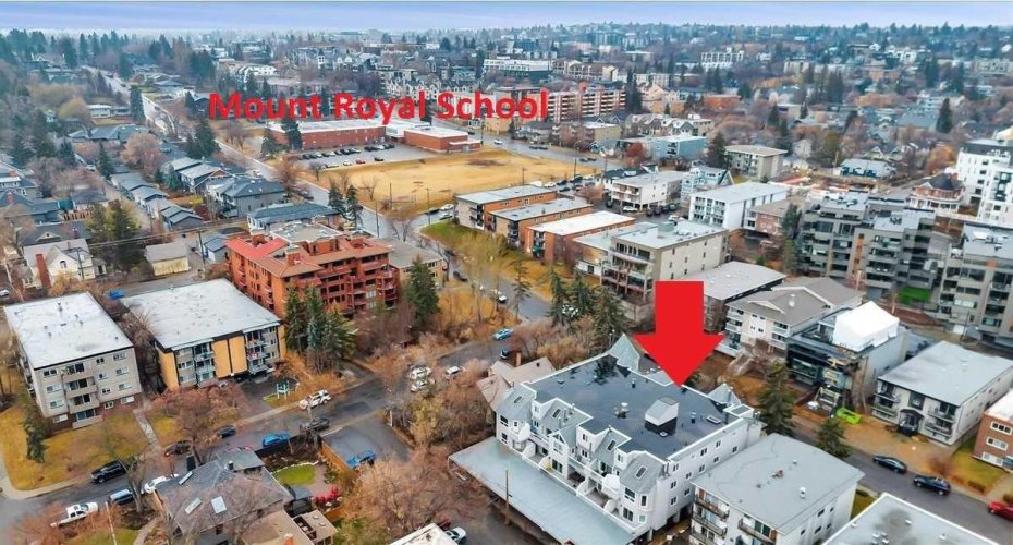 Southwest view of Mount Royal School, 14 street, and Marda Loop in background.
