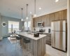 Open floor plan kitchen and living room with stunning unobstructed views