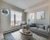 Large bright window in living room for you to enjoy the expansive views