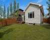 Back yard and deck with master bedroom and living room access