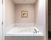 Bath tub in primary bedroom