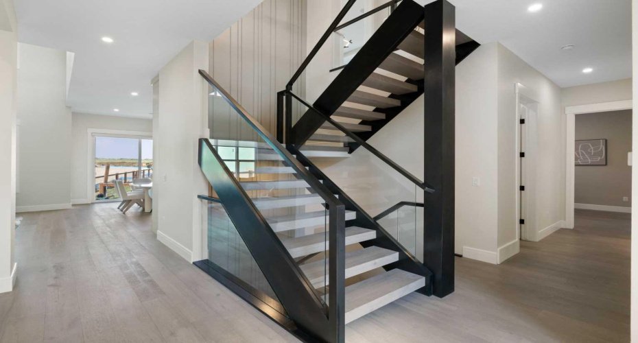 232 West Chestermere Drive, Chestermere, Alberta T1X 1B2, 7 Bedrooms Bedrooms, ,5 BathroomsBathrooms,Residential,For Sale,West Chestermere,A2285107