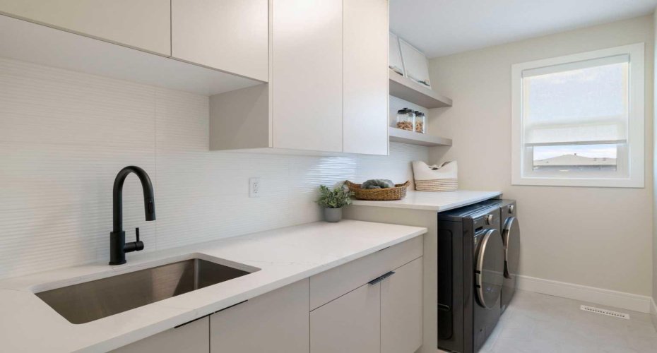 232 West Chestermere Drive, Chestermere, Alberta T1X 1B2, 7 Bedrooms Bedrooms, ,5 BathroomsBathrooms,Residential,For Sale,West Chestermere,A2285107