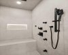 Steam shower with body jets and heated bench