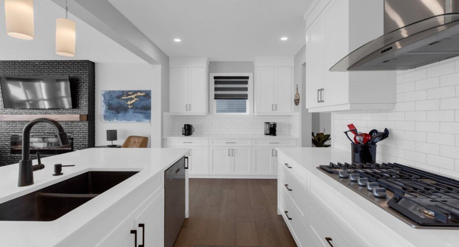 KITCHEN LOOKING BACK TO COFFEE/SERVING AREA