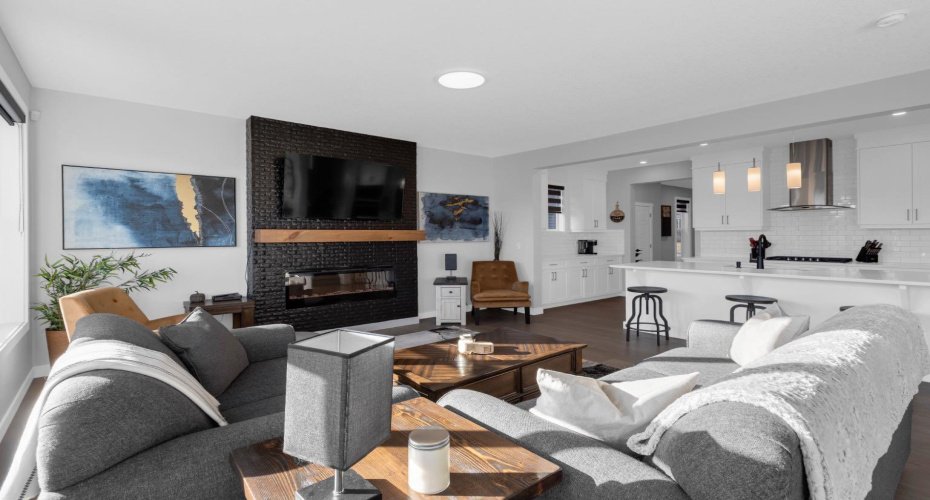 LIVING ROOM WITH WARM FEATURE FIREPLACE