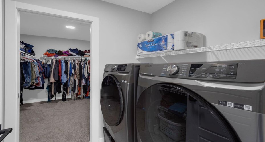 PRIMARY CLOSET WALK-THRU TO LAUNDRY ROOM