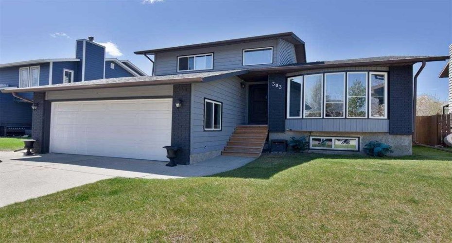 303 Woodside Place, Okotoks, Alberta T1S 1L9, 5 Bedrooms Bedrooms, ,3 BathroomsBathrooms,Residential,For Sale,Woodside,A2285284