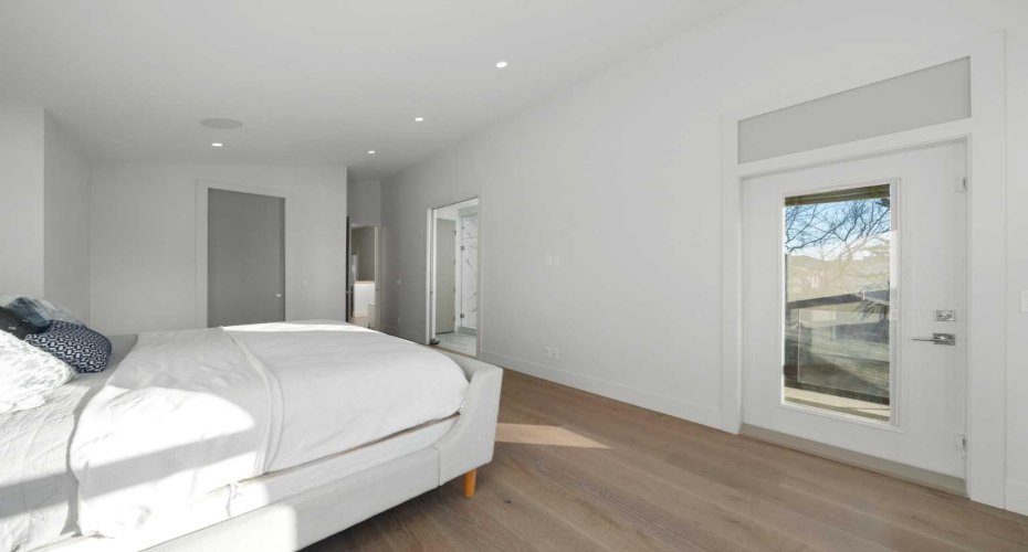 Primary Bedroom with Vaulted Ceiling