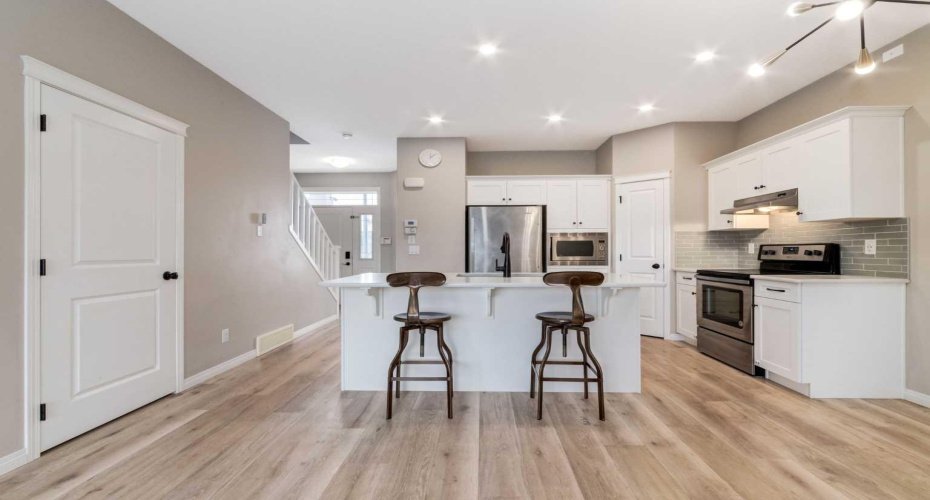 730 Belmont Drive, Calgary, Alberta T2X 4H3, 2 Bedrooms Bedrooms, ,3 BathroomsBathrooms,Residential,For Sale,Belmont,A2286204