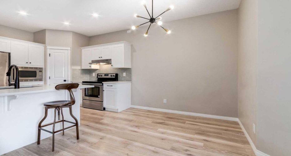 730 Belmont Drive, Calgary, Alberta T2X 4H3, 2 Bedrooms Bedrooms, ,3 BathroomsBathrooms,Residential,For Sale,Belmont,A2286204