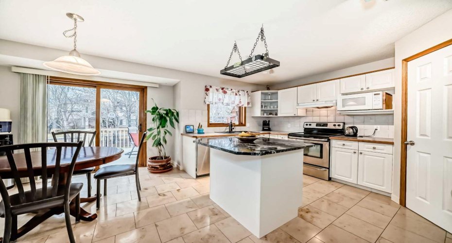 66 Tuscany Hills Point, Calgary, Alberta T3L 2C7, 4 Bedrooms Bedrooms, ,4 BathroomsBathrooms,Residential,For Sale,Tuscany Hills,A2286376