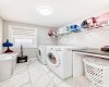 Upper Laundry room Tile Flooring .