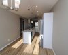 The dining area, the kitchen and the living room. Image from 443 Henricks Dr.