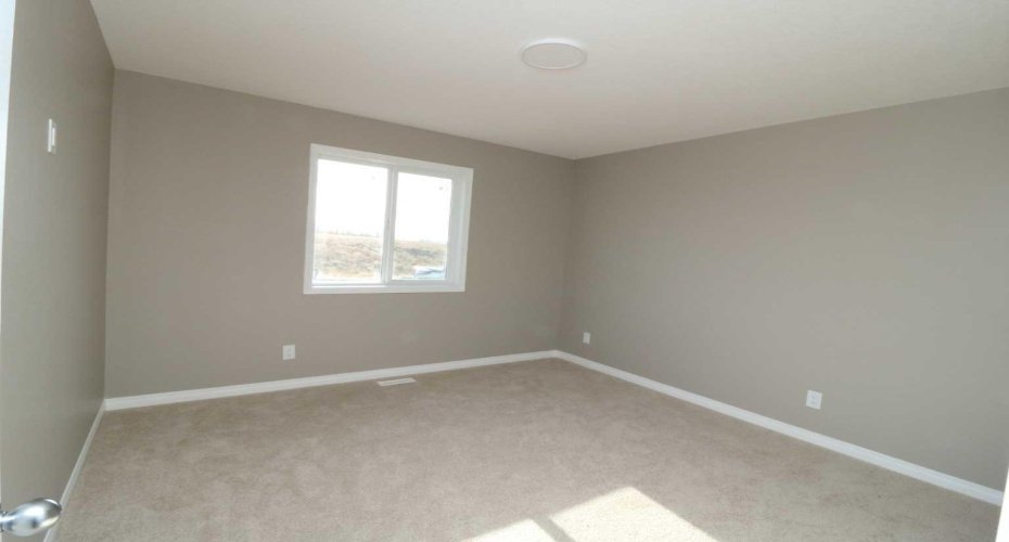 Primary/master bedroom.  Image from 443 Henricks Dr.