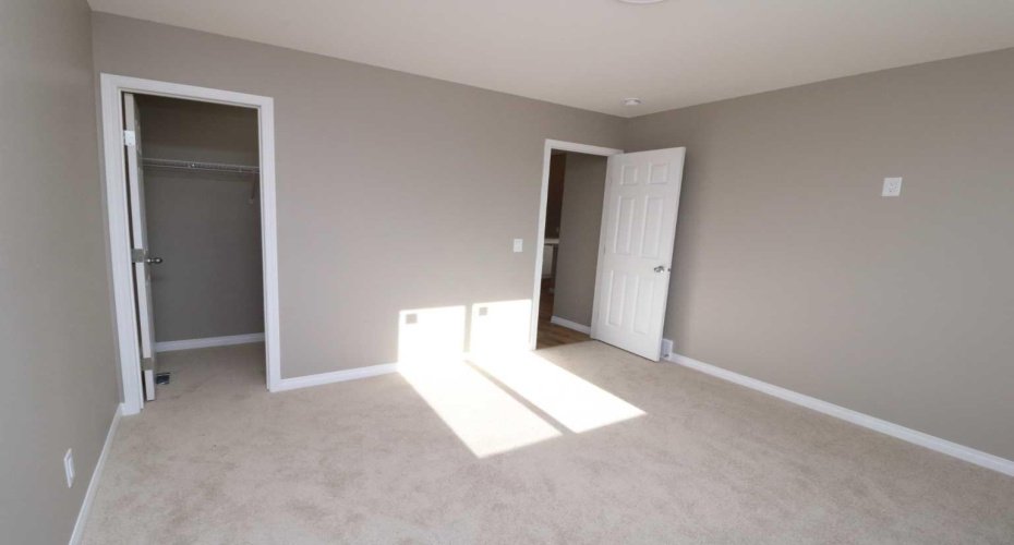 Primary/master bedroom.  Image from 443 Henricks Dr.