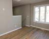 Living room, heading to the basement. Bedroom.  Image from 443 Henricks Dr.