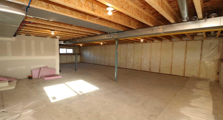 Basement, large windows. Image from 443 Henricks Dr.