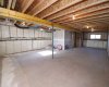 Basement, large windows. Image from 443 Henricks Dr.