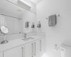 Primary Ensuite with undermount Lighting and quartz counters
