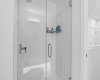 Glass enclosed Shower in main bath