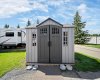 Storage shed is also included