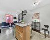 Island gives additional work space, storage or dining