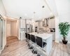 Open-concept kitchen, dining living room area.