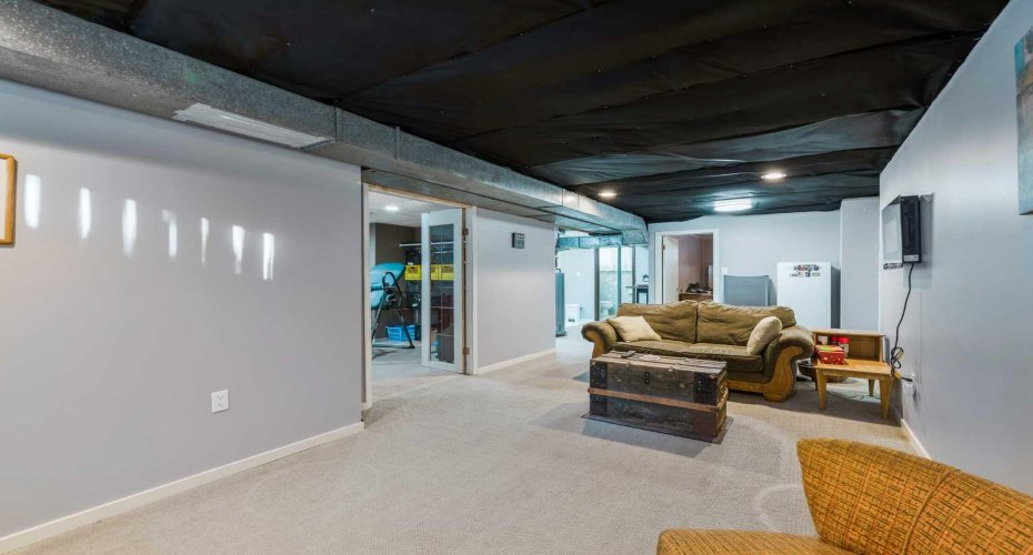 126 Springwood Drive, Calgary, Alberta T2W 0K5, 5 Bedrooms Bedrooms, ,2 BathroomsBathrooms,Residential,For Sale,Springwood,A2288413