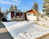 126 Springwood Drive, Calgary, Alberta T2W 0K5, 5 Bedrooms Bedrooms, ,2 BathroomsBathrooms,Residential,For Sale,Springwood,A2288413