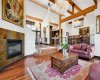 Living room with dining room and kitchen beyond