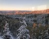 Sun coming down the hills