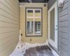 Entry to Unit via south exterior corridor