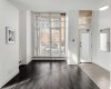 Open concept main floor with floor to ceiling windows.