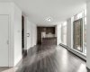 Open concept main floor with floor to ceiling windows.