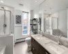 5pc ensuite features dual sinks, large soaker tub & glass surround shower.