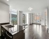 Kitchen features stainless steel appliances, quartz counters & ample cabinet space.