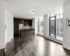 Kitchen features stainless steel appliances, quartz counters & ample cabinet space.