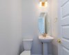 Powder room with elegant fixtures